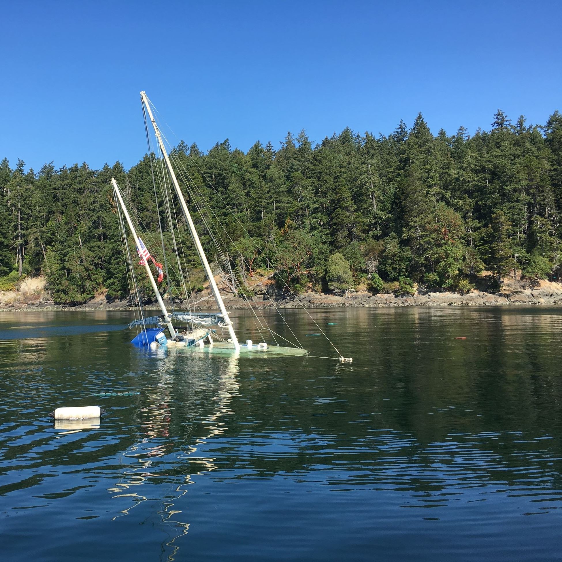sunken boat in a cove