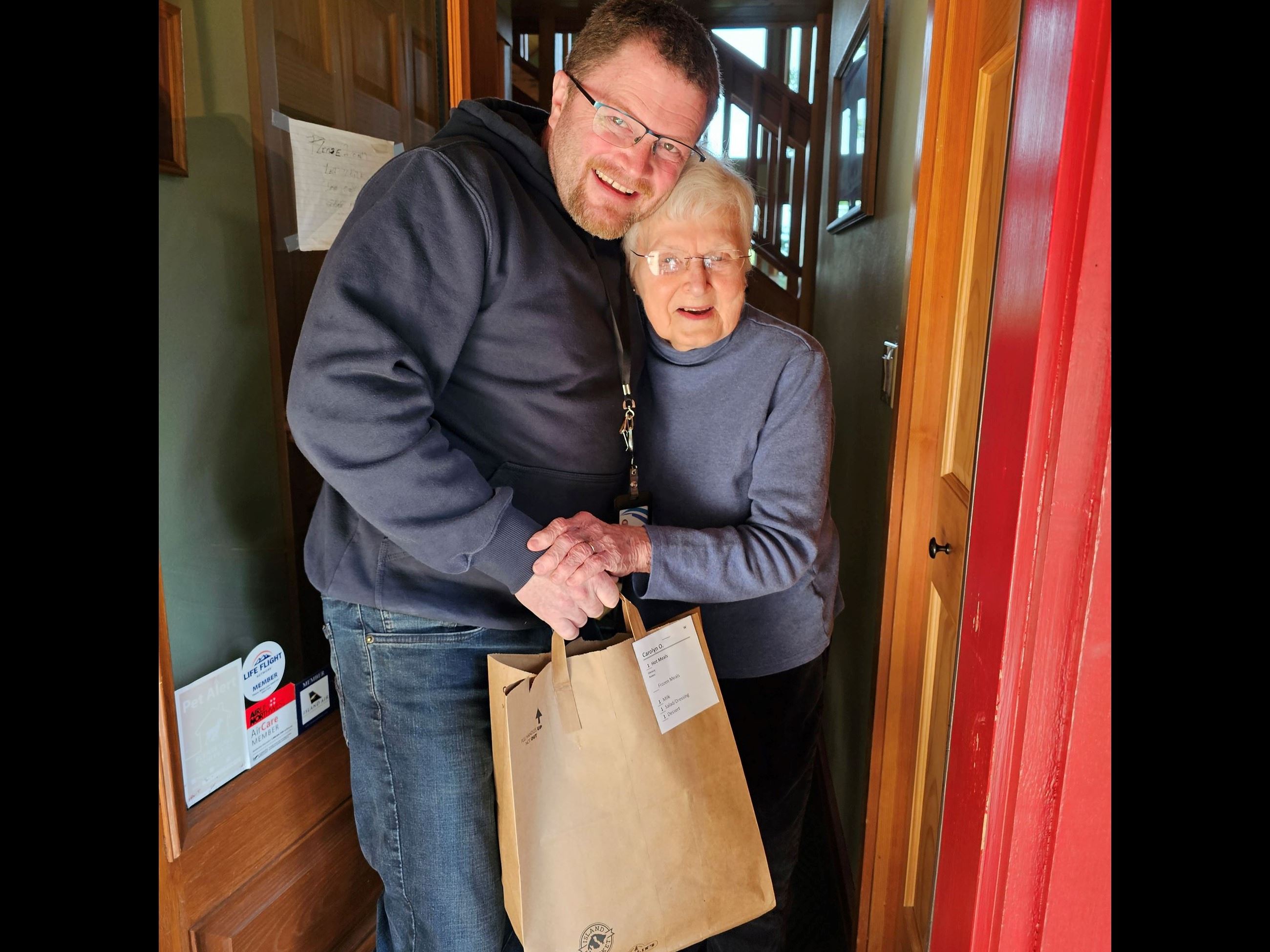 Meals on Wheels Justin Paulsen with Carolyn ODay